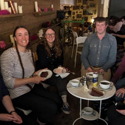 Members of the NW PEP network enjoying coffee and cake together