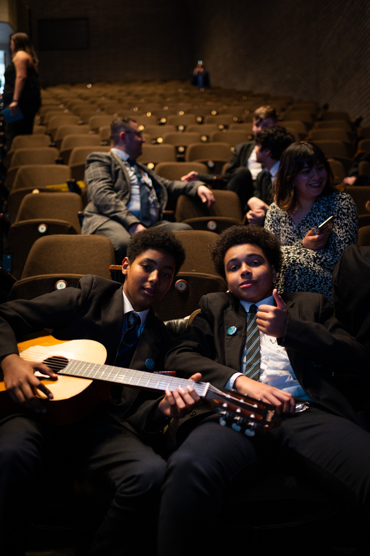 Two students preparing for the performance