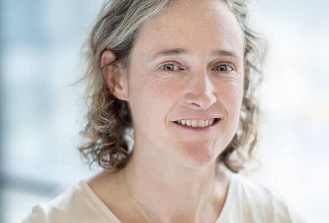 Headshot of a woman smiling at the camera