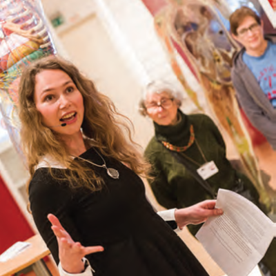 Lady giving a demonstration to audience